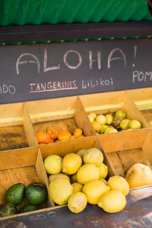 Yellow Round Fruits on Brown Wooden Crate